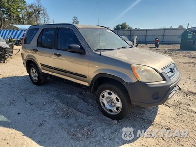Czwarte zdjęcie samochodu z boku: 2006 HONDA CR-V LX VIN:JHLRD685X6C009877 - miniatura