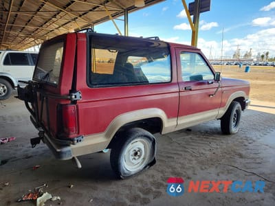Trzecie zdjęcie samochodu z tyłu: 1990 FORD BRONCO II VIN:1FMCU12T1LUA11502 - miniatura