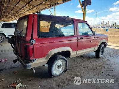 Trzecie zdjęcie samochodu z tyłu: 1990 FORD BRONCO II VIN:1FMCU12T1LUA11502 - miniatura