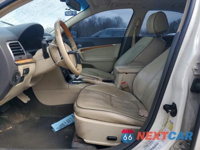 Zdjęcie 7 z 13 samochodu: 2012 LINCOLN MKZ HYBRID VIN:3LNDL2L3XCR808673 - miniatura