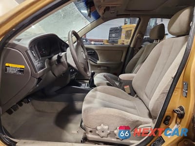 Zdjęcie 7 z 12 samochodu: 2004 HYUNDAI ELANTRA GLS VIN:KMHDN46D14U745290 - miniatura