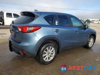 Trzecie zdjęcie samochodu z tyłu: 2016 MAZDA CX-5 TOURING VIN:JM3KE2CYXG0860917 - miniatura
