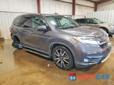 Czwarte zdjęcie samochodu z boku: 2020 HONDA PILOT TOURING VIN:5FNYF6H95LB005126 - miniatura