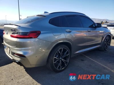 Trzecie zdjęcie samochodu z tyłu: 2021 BMW X4 M COMPETITION VIN:5YMUJ0C08M9G91140 - miniatura