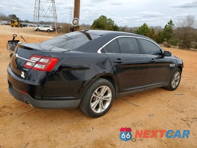 Trzecie zdjęcie samochodu z tyłu: 2016 FORD TAURUS SE VIN:1FAHP2D83GG139105 - miniatura