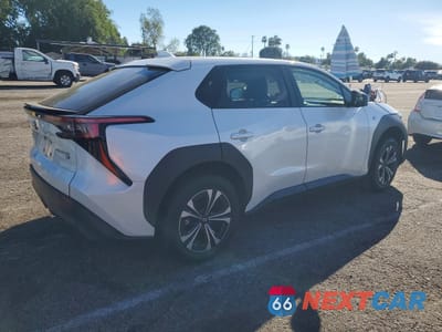 Trzecie zdjęcie samochodu z tyłu: 2023 SUBARU SOLTERRA PREMIUM VIN:JTMABABA5PA027290 - miniatura