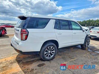 Trzecie zdjęcie samochodu z tyłu: 2021 CHEVROLET TAHOE C1500 LT VIN:1GNSCNKD8MR324335 - miniatura