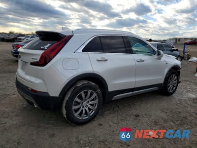 Trzecie zdjęcie samochodu z tyłu: 2019 CADILLAC XT4 PREMIUM LUXURY VIN:1GYFZDR42KF113830 - miniatura