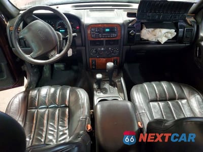 Zdjęcie 8 z 13 samochodu: 1999 JEEP GRAND CHEROKEE LIMITED VIN:1J4GW68N3XC632994 - miniatura