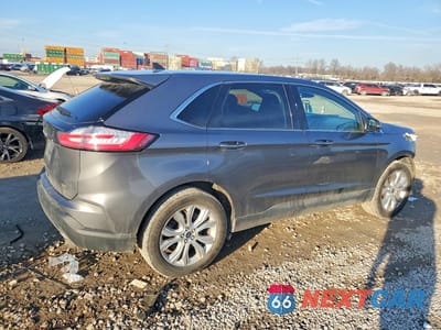 Trzecie zdjęcie samochodu z tyłu: 2022 FORD EDGE TITANIUM VIN:2FMPK4K90NBA45470 - miniatura
