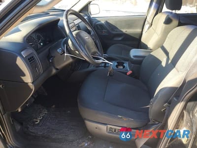 Zdjęcie 7 z 13 samochodu: 2002 JEEP GRAND CHEROKEE LAREDO VIN:1J4GW48S82C178860 - miniatura