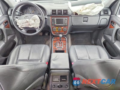 Zdjęcie 8 z 13 samochodu: 2002 MERCEDES-BENZ ML 320 VIN:4JGAB54E92A348325 - miniatura