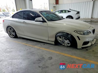 Czwarte zdjęcie samochodu z boku: 2016 BMW 228 I SULEV VIN:WBA1F9C53GV742708 - miniatura