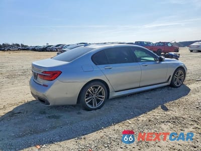 Trzecie zdjęcie samochodu z tyłu: 2016 BMW 750 XI VIN:WBA7F2C5XGG418581 - miniatura
