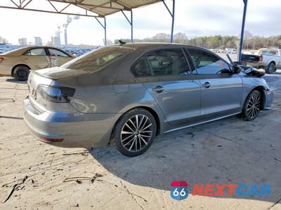 Trzecie zdjęcie samochodu z tyłu: 2016 VOLKSWAGEN JETTA SPORT VIN:3VWD17AJ3GM399263 - miniatura