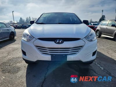 Piąte zdjęcie samochodu w środku: 2011 HYUNDAI TUCSON GL VIN:KM8JT3AB3BU120105 - miniatura