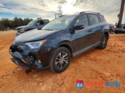 2016 TOYOTA RAV4 HYBRID JTMRJREV6GD023704 - główne zdjęcie licytacji z USA - miniatura