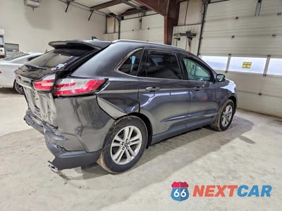 Trzecie zdjęcie samochodu z tyłu: 2020 FORD EDGE SEL VIN:2FMPK4J92LBB30289 - miniatura