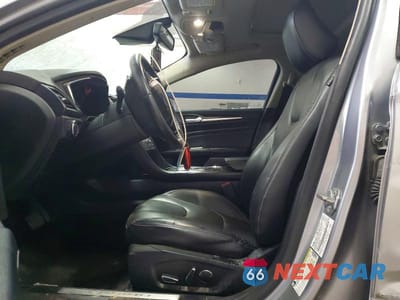 Zdjęcie 7 z 11 samochodu: 2020 FORD FUSION TITANIUM VIN:3FA6P0D96LR115436 - miniatura