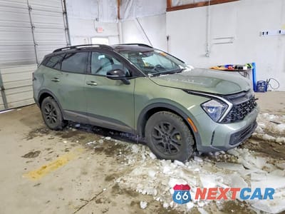 Czwarte zdjęcie samochodu z boku: 2023 KIA SPORTAGE X-PRO VIN:5XYK7CAF6PG100021 - miniatura