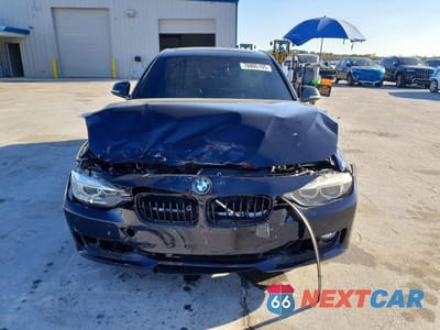 Piąte zdjęcie samochodu w środku: 2014 BMW 335 I VIN:WBA3A9G57ENS65506 - miniatura
