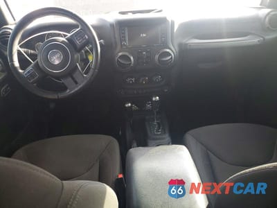 Zdjęcie 8 z 11 samochodu: 2016 JEEP WRANGLER UNLIMITED SPORT VIN:1C4BJWDG7GL286891 - miniatura