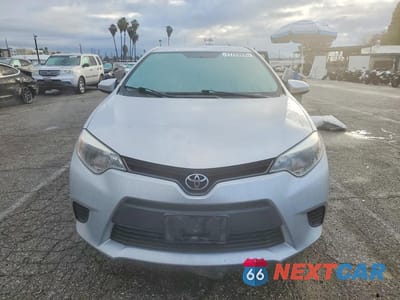 Piąte zdjęcie samochodu w środku: 2016 TOYOTA COROLLA L VIN:5YFBURHE6GP501377 - miniatura