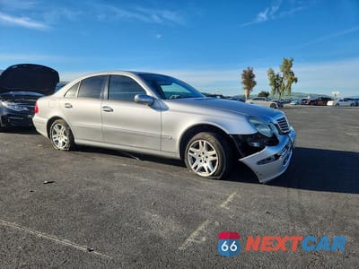 Czwarte zdjęcie samochodu z boku: 2003 MERCEDES-BENZ E 320 VIN:WDBUF65J23A232228 - miniatura