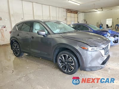 Czwarte zdjęcie samochodu z boku: 2023 MAZDA CX-5 PREMIUM VIN:JM3KFBDM1P0180347 - miniatura