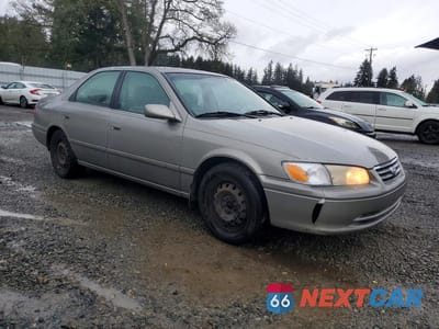 Czwarte zdjęcie samochodu z boku: 2001 TOYOTA CAMRY LE VIN:JT2BG22KX10563016 - miniatura