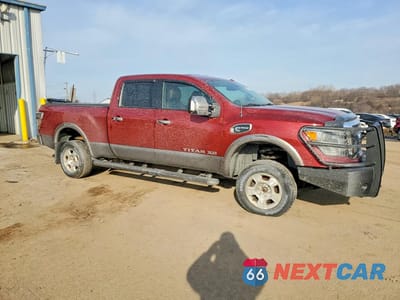 Czwarte zdjęcie samochodu z boku: 2016 NISSAN TITAN XD 4WD V8 TDSL 5.0L PLATINUM VIN:1N6BA1F40GN510333 - miniatura