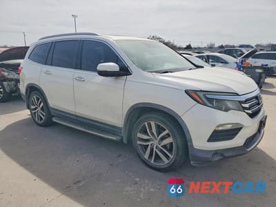 Czwarte zdjęcie samochodu z boku: 2017 HONDA PILOT ELITE VIN:5FNYF6H07HB099759 - miniatura