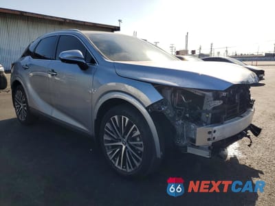 Czwarte zdjęcie samochodu z boku: 2024 LEXUS RX 350H BASE VIN:2T2BBMCA0RC057229 - miniatura
