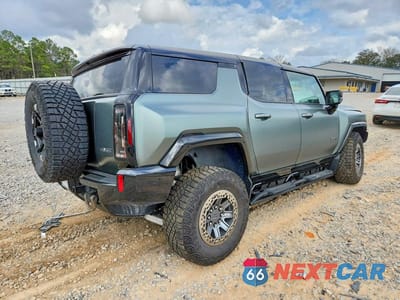 Trzecie zdjęcie samochodu z tyłu: 2024 GMC HUMMER SUV 3X VIN:1GKB0RDC6RU102303 - miniatura
