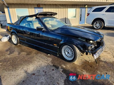 Czwarte zdjęcie samochodu z boku: 1999 BMW 323 IC AUTOMATIC VIN:WBABJ8336XEM26019 - miniatura