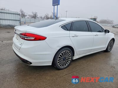 Trzecie zdjęcie samochodu z tyłu: 2017 FORD FUSION SE VIN:3FA6P0T91HR121315 - miniatura