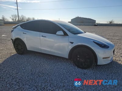 Czwarte zdjęcie samochodu z boku: 2023 TESLA MODEL Y VIN:7SAYGAEE7PF805761 - miniatura