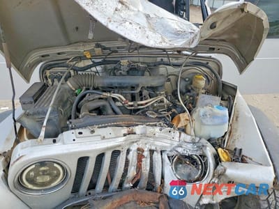 Zdjęcie 11 z 12 samochodu: 2004 JEEP WRANGLER / TJ SPORT VIN:1J4FA49S54P723627 - miniatura