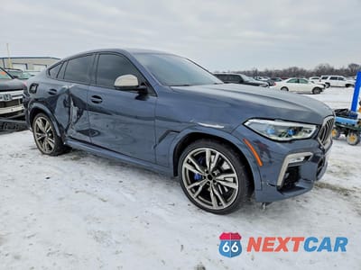 Czwarte zdjęcie samochodu z boku: 2020 BMW X6 M50I VIN:5UXCY8C0XL9C87008 - miniatura