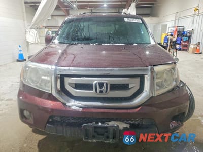 Piąte zdjęcie samochodu w środku: 2011 HONDA PILOT EXL VIN:5FNYF4H68BB015500 - miniatura