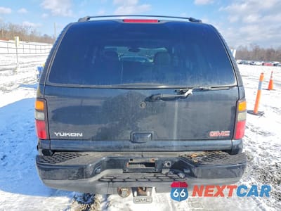Zdjęcie 6 z 14 samochodu: 2004 GMC YUKON DENALI VIN:1GKEK63UX4J290303 - miniatura