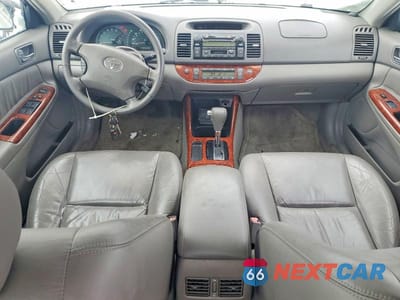 Zdjęcie 8 z 12 samochodu: 2003 TOYOTA CAMRY LE VIN:4T1BF32K93U551642 - miniatura
