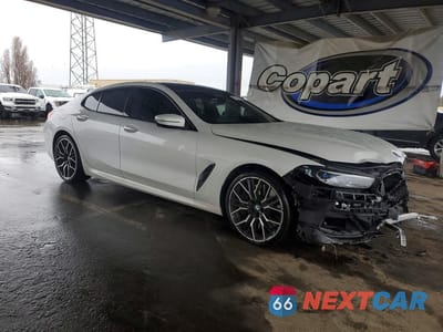 Czwarte zdjęcie samochodu z boku: 2024 BMW 840XI VIN:WBAGV4C03RCR23133 - miniatura