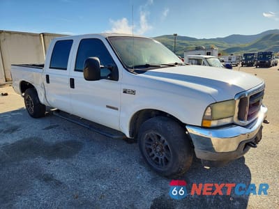 Czwarte zdjęcie samochodu z boku: 2004 FORD F250 SUPER DUTY VIN:1FTNW20P34EA44340 - miniatura