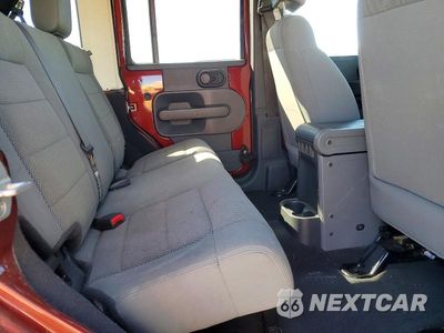 Zdjęcie 10 z 11 samochodu: 2007 JEEP WRANGLER SAHARA VIN:1J8GB59187L108143 - miniatura