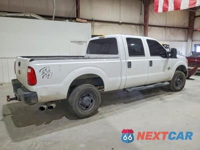 Trzecie zdjęcie samochodu z tyłu: 2014 FORD F250 SUPER DUTY VIN:1FT7W2BT9EEA43536 - miniatura