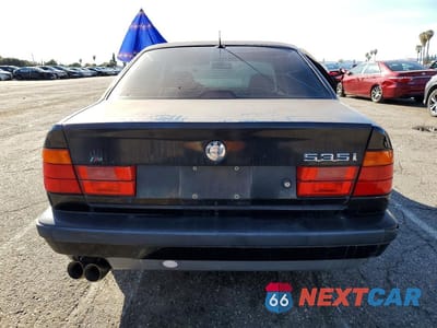 Zdjęcie 6 z 11 samochodu: 1988 BMW 3 SERIES VIN:WBAHD2314MBF72092 - miniatura