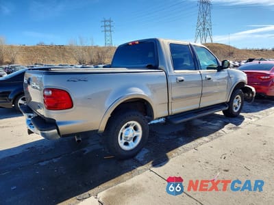 Trzecie zdjęcie samochodu z tyłu: 2001 FORD F150 SUPERCREW VIN:1FTRW08L11KB55604 - miniatura