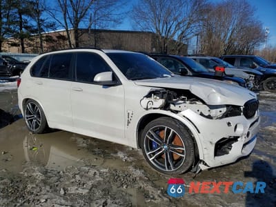 Czwarte zdjęcie samochodu z boku: 2016 BMW X5 M VIN:5YMKT6C5XG0R78050 - miniatura