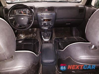 Zdjęcie 8 z 13 samochodu: 2006 HUMMER H3 VIN:5GTDN136468158062 - miniatura